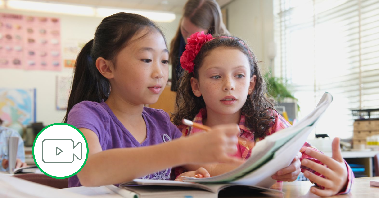 two elementary schoolers in class