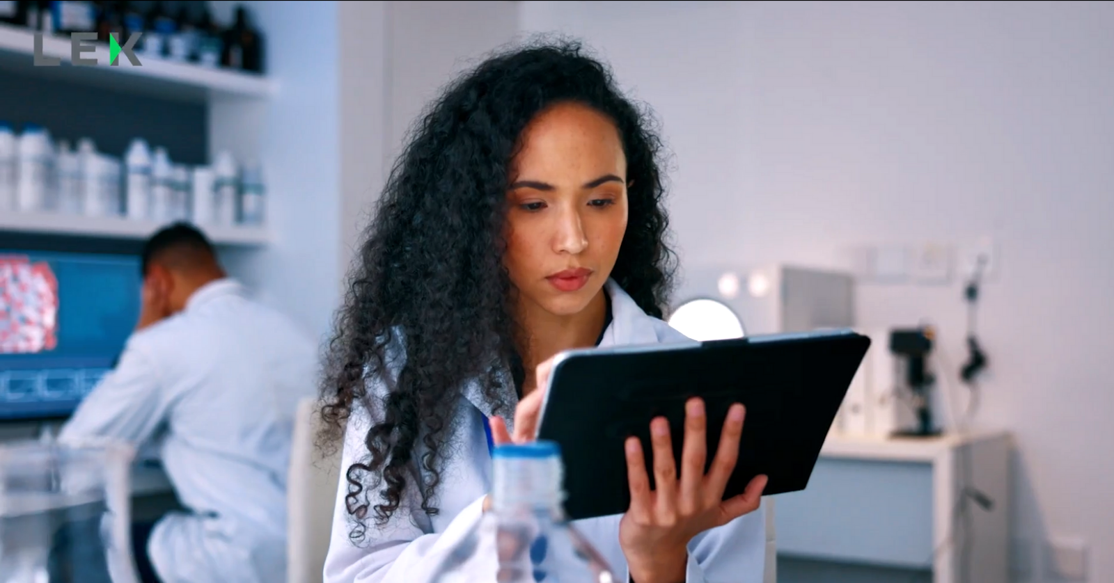 researcher holding tablet