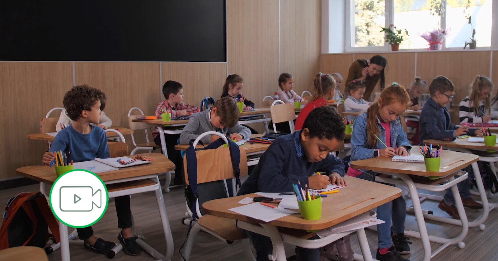 Young children sitting in classroom