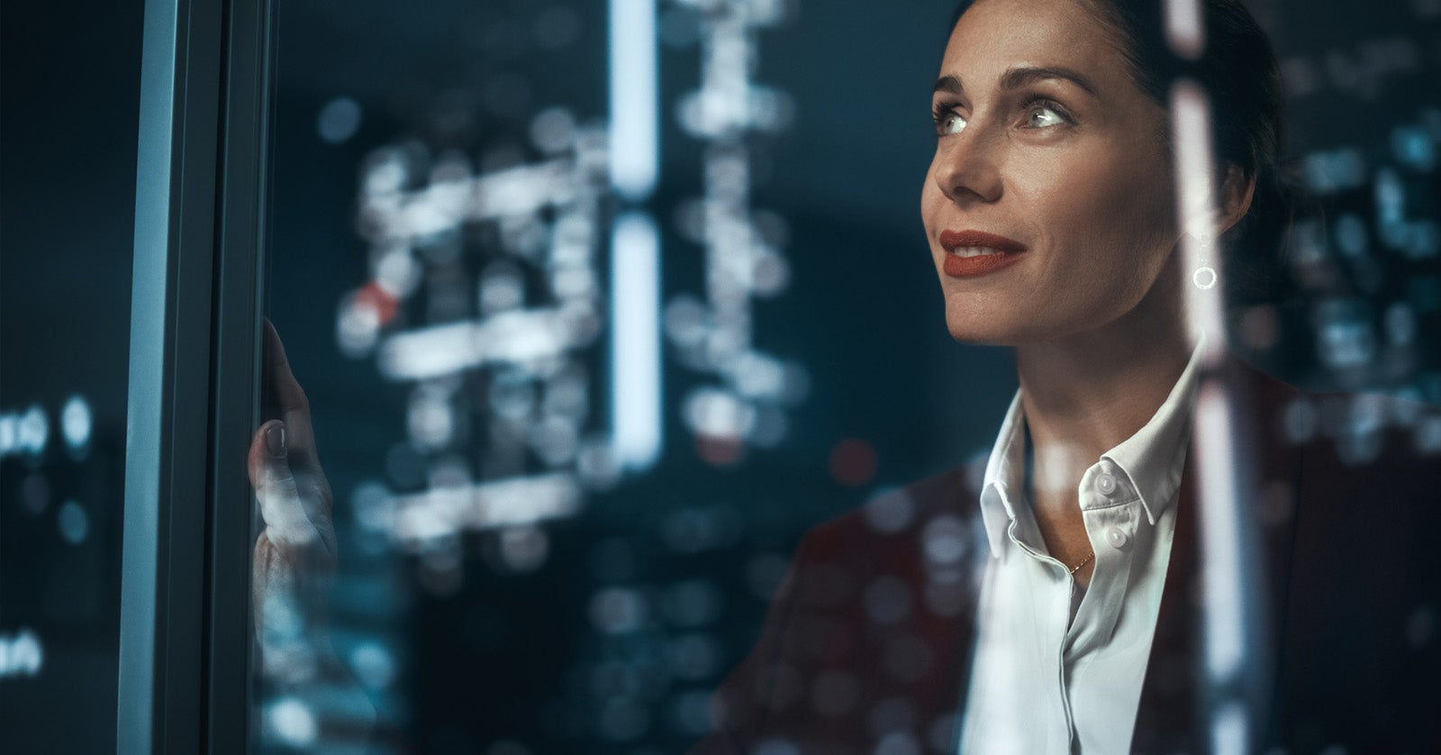 Woman looking out window