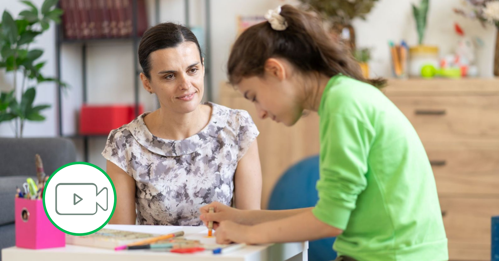 teacher and student in classroom