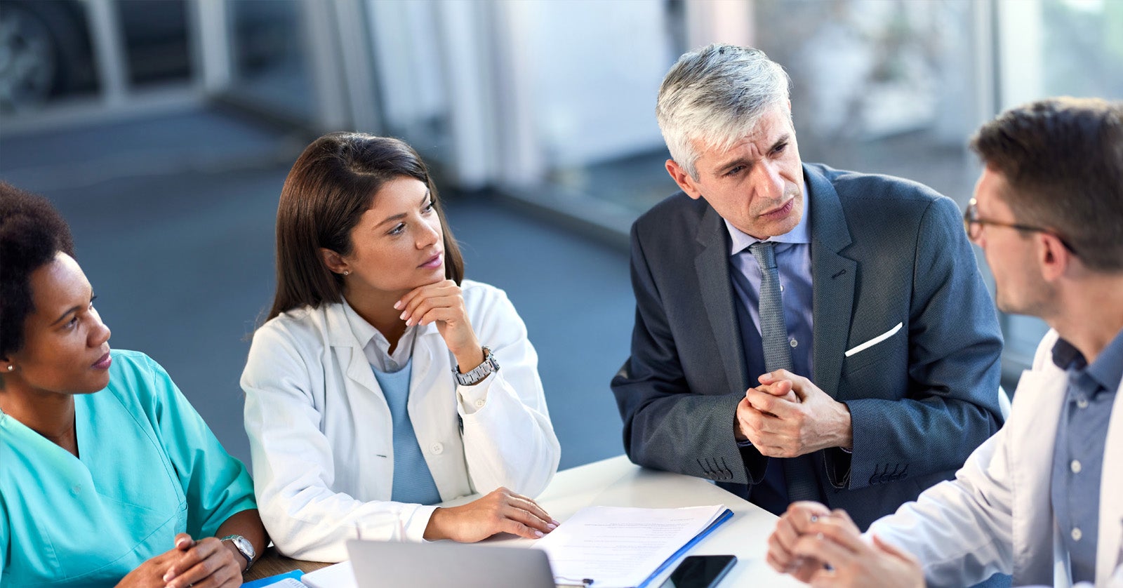 Healthcare executives meeting about healthcare issues